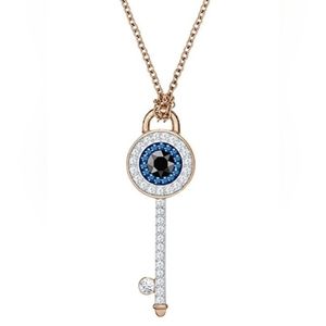New in box Swarovski duo Evil Eye Key pendant